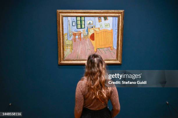 Girl visits the Van Gogh Museum on December 8, 2022 in Amsterdam, Netherlands. The Van Gogh Museum is a museum located in Amsterdam that has the...