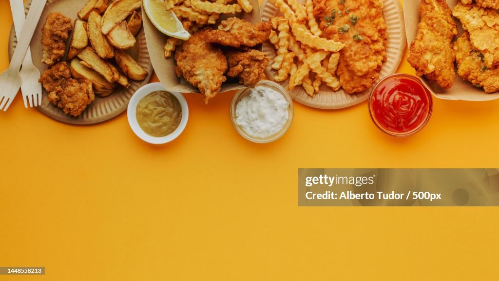 Top view fish chips with copy space variety sauces