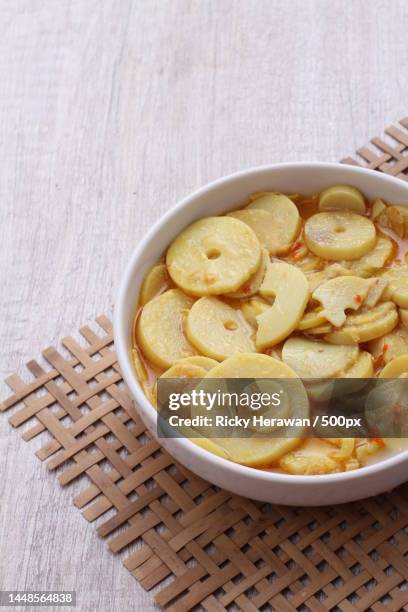 high angle view of ginger in bowl on table,bekasi,indonesia - lancashire hotpot stock pictures, royalty-free photos & images