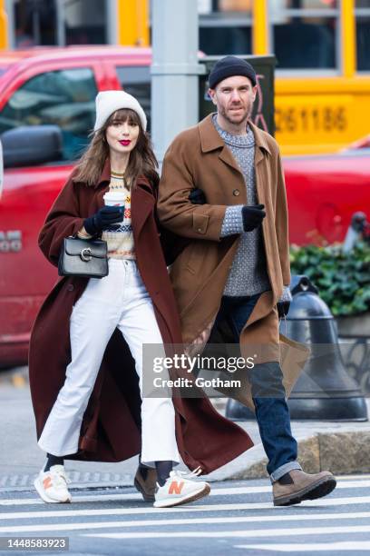 Lily Collins and Charlie McDowell are seen in SoHo on December 12, 2022 in New York City.