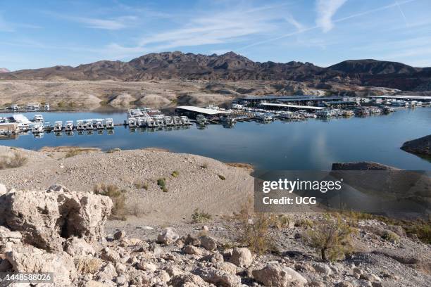 Strandlines left by falling lake levels and existing boat docks Callville Bay, Lake Mead, Nevada.