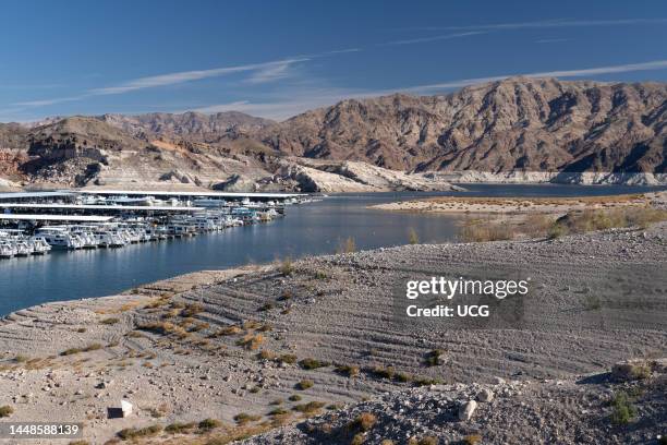 Strandlines and calcium carbonate "bathtub ring" left by falling lake levels at Lake Mead, Nevada.