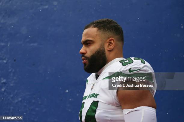 Solomon Thomas of the New York Jets walks in the tunnel before the second half of an NFL football game against the Buffalo Bills at Highmark Stadium...