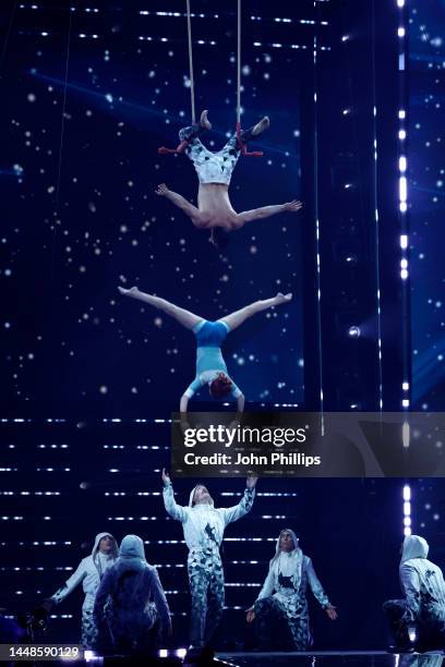 Cirque du Soleil perform on stage at The National Lottery's Big Bash to celebrate 2022's entertainment packed year at OVO Arena Wembley on December...