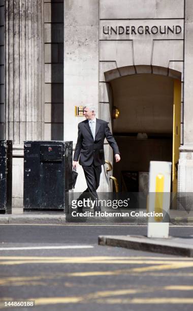Businessman Crossing a Street, London