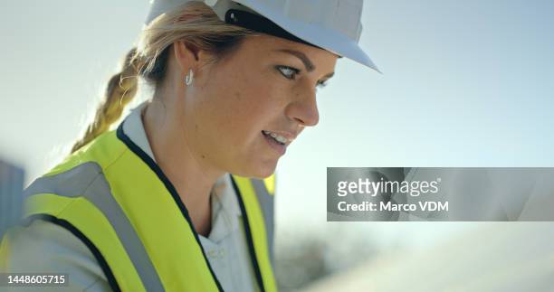 engineer, planning and construction work while thinking, strategy and idea on a job site outdoor. woman building development manager about to start working on engineering industrial plans outside - handyman stockfoto's en -beelden