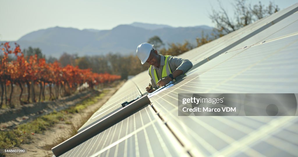 Black man, engineer or solar energy management in electricity sustainability, solar panels or sun grid plant. Worker, employee or technician on renewable energy farm, biodegradable environment or eco
