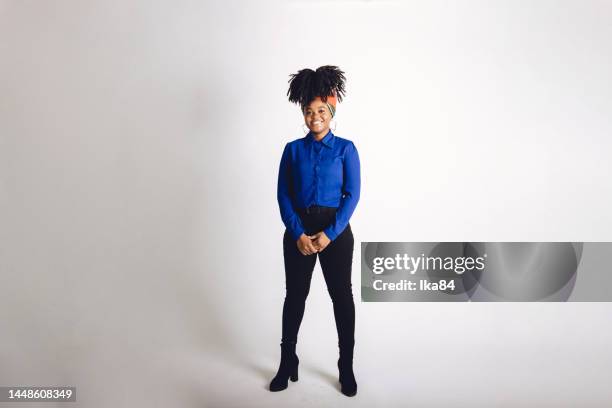 young beautiful african-american female adult in a studio portrait photo - vestido preto imagens e fotografias de stock