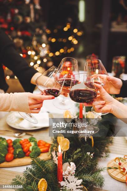 christmas and new year celebration with red wine. - wine christmas stock pictures, royalty-free photos & images
