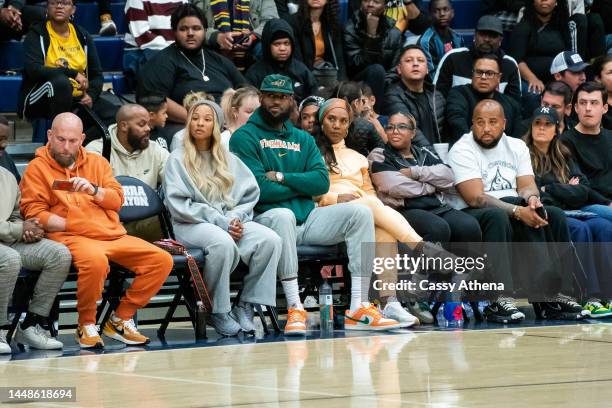 Savannah James, LeBron James and Gloria James sit court side at the Sierra Canyon vs King Drew boys basketball game at Sierra Canyon High School on...