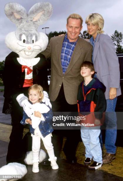 Canadian American actor, comedian, screenwriter and graphic designer Phil Hartman , wife Brynn , daughter Birgen and son Sean pose for a portrait...