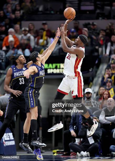 Jimmy Butler of the Miami Heat shoots the ball against the Indiana Pacers at Gainbridge Fieldhouse on December 12, 2022 in Indianapolis, Indiana....