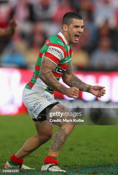 Adam Reynolds of the Rabbitohs celebrates after kicking a field goal to win the match in golden point extra time during the round 11 NRL match...