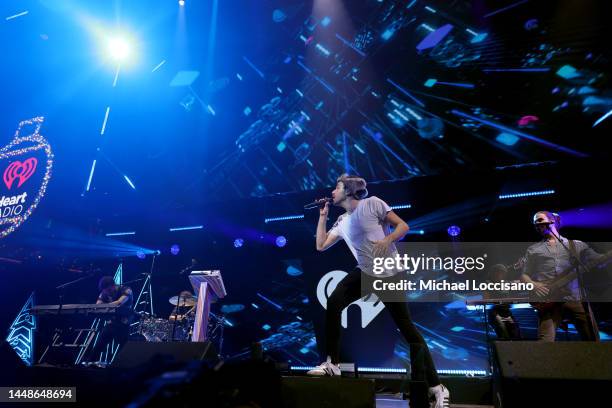 Ryan Met, Jack Met and Adam Met of AJR perform on stage at iHeartRadio Q102’s Jingle Ball 2022 Presented by Capital One at Wells Fargo Center on...