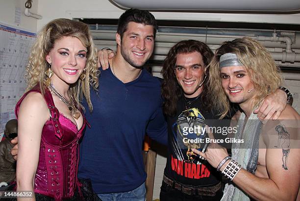 Ashley Spencer, Tim Tebow, Justin Matthew Sargent and Jeremy Woodard pose backstage at the hit rock musical "Rock of Ages" on Broadway at The Helen...