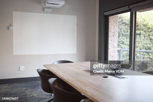 table, desk or boardroom furniture in empty office with laptop for digital marketing presentation, advertising training or meeting. chairs, seating or company workshop room for teamwork collaboration - meeting room stock pictures, royalty-free photos & images