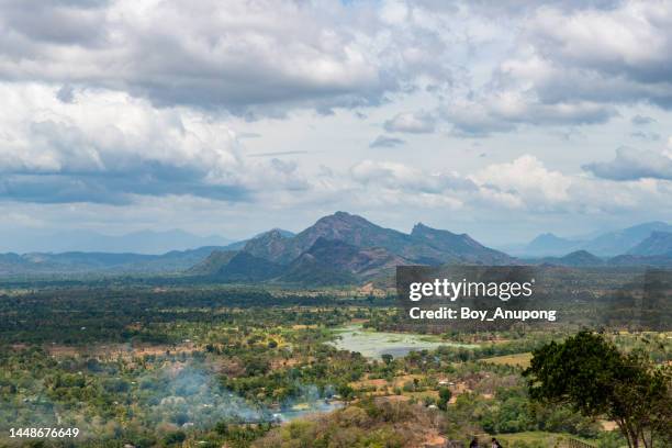 the landscape view from top of sigiriya rock (lion rock) an iconic tourist destination and one of unesco world heritage site in sri lanka. black and white tone. - sigiriya stock pictures, royalty-free photos & images