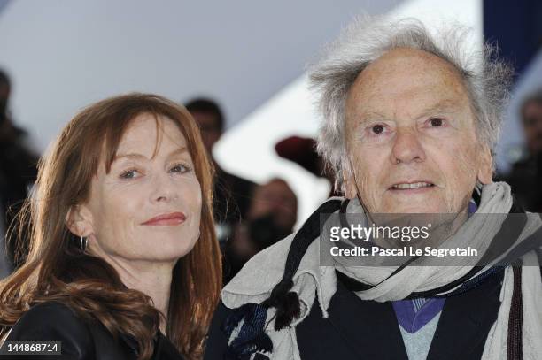 Actress Isabelle Huppert and actor Jean-Louis Trintignant pose at the "Amour" Photocall during the 65th Annual Cannes Film Festival at Palais des...