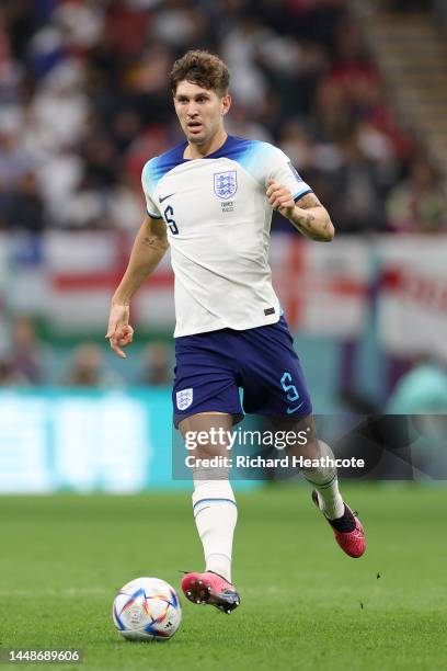 John Stones of England in action during the FIFA World Cup Qatar 2022 quarter final match between England and France at Al Bayt Stadium on December...