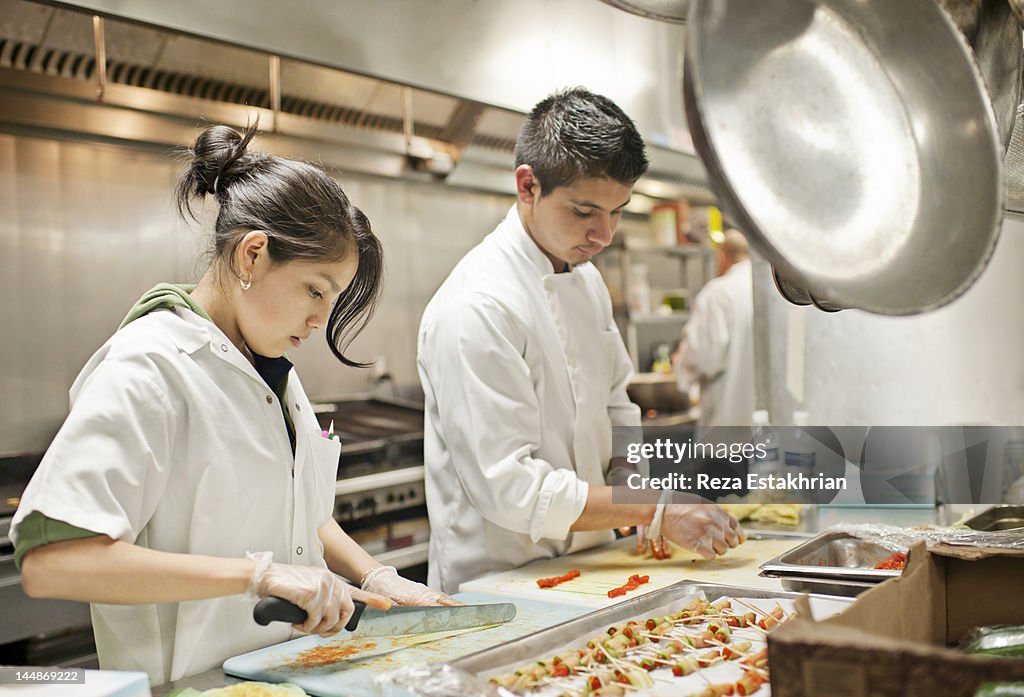 Chefs prepare appetizers