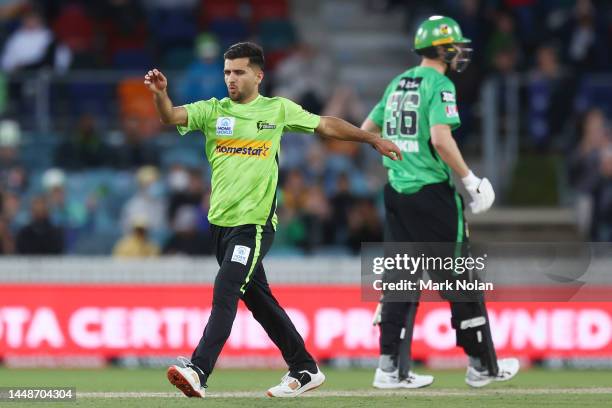 Fazalhaq Farooqi of the Thunder celebrates taking a wicket during the Men's Big Bash League match between the Sydney Thunder and the Melbourne Stars...