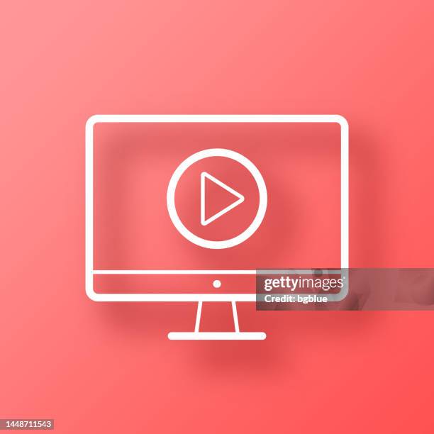 desktop computer with play button. icon on red background with shadow - white play button stock illustrations