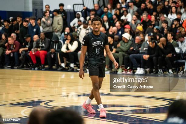 Bronny James looks on during the Sierra Canyon vs Christ The King boys basketball game at Sierra Canyon High School on December 12, 2022 in...