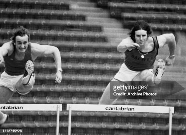 British champion 400-metre hurdlers, Alan Pascoe, left and Bill Hartley training for the Montreal Olympic Games at Crystal Palace athletics track,...