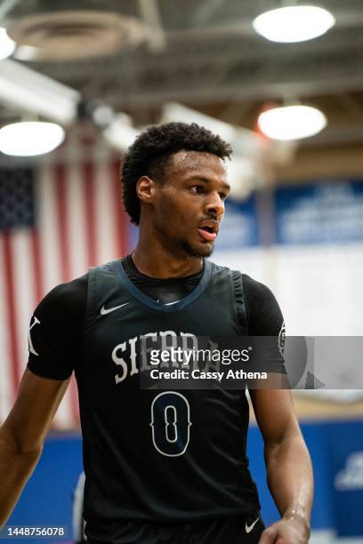 Bronny James looks on at the Sierra Canyon vs Christ The King boys basketball game at Sierra Canyon High School on December 12, 2022 in Chatsworth,...
