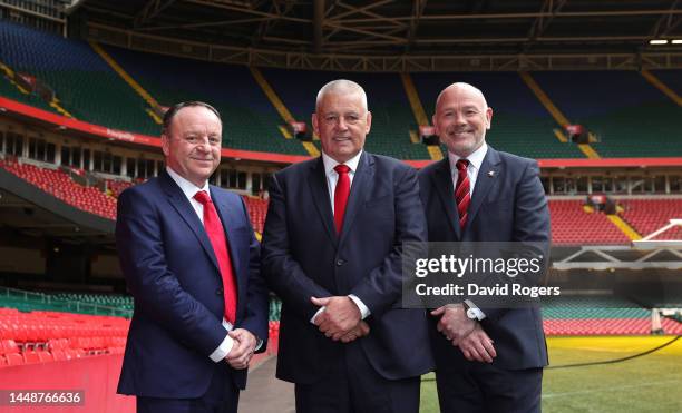 Warren Gatland, who returns for a second stint as the Wales head coach, poses alongside Steve Phillips, the WRU chief executive and Ieuan Evans the...