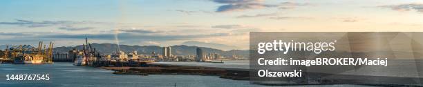 panorama of container port and cruise ships at sunrise in barcelona, catalonia, spain - spartan cruiser stock pictures, royalty-free photos & images