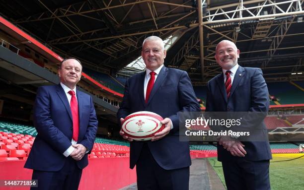 Warren Gatland, who returns for a second stint as the Wales head coach, poses alongside Steve Phillips, the WRU chief executive and Ieuan Evans the...