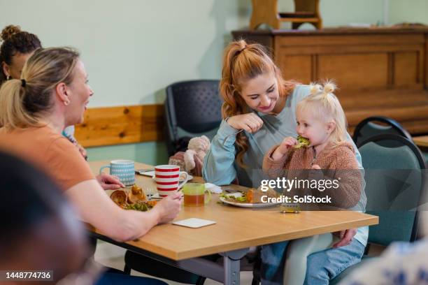 enjoying tasty veggies - foodbanks for the needy stock pictures, royalty-free photos & images