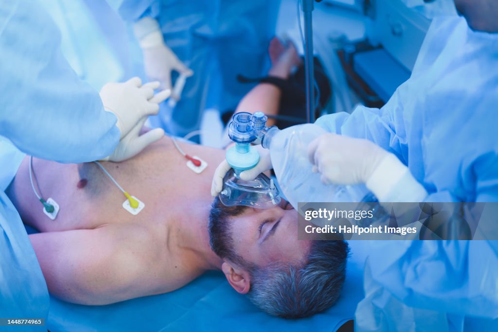 Close-up of mature patient during operation.