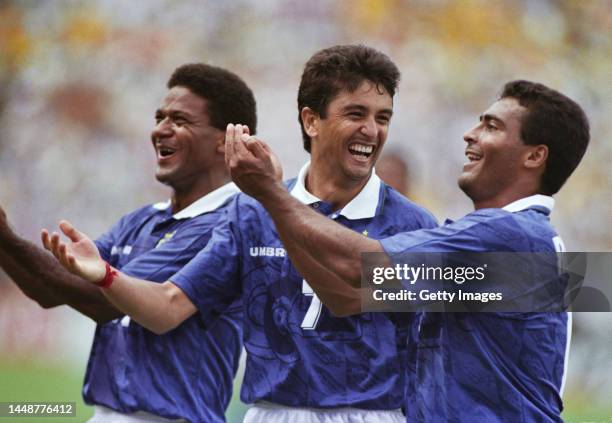 Bebeto celebrates the second Brazil goal by doing the 'Rocking the Baby' celebration with team mates Mazinho and Romario during the 1994 FIFA World...