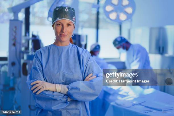 portrait of surgeon in operating ward. - surgical-glove stock pictures, royalty-free photos & images