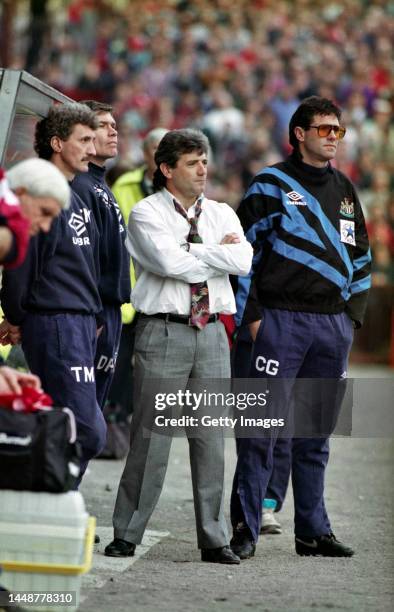 Newcastle United manager Kevin Keegan with coaches Terry McDermott Derek Fazackerley and kit man Chris Guthrie look on from the sidelines during a...