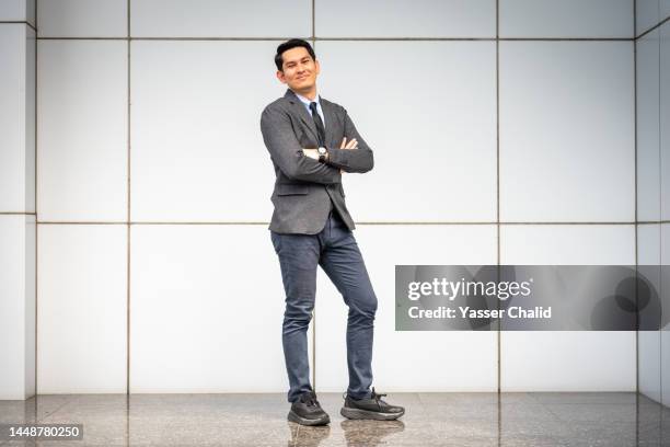 portrait of asian businessman - indonesian ethnicity stock pictures, royalty-free photos & images