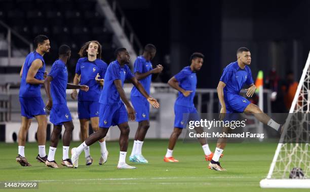 Kylian Mbappe of France trains with teammates during the France Training Session at Al Sadd SC on December 13, 2022 in Doha, Qatar.