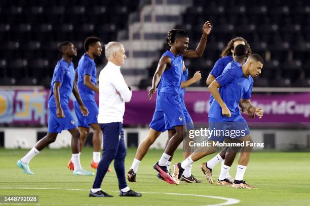 Kylian Mbappe of France trains with teammates during the France Training Session at Al Sadd SC on December 13, 2022 in Doha, Qatar.