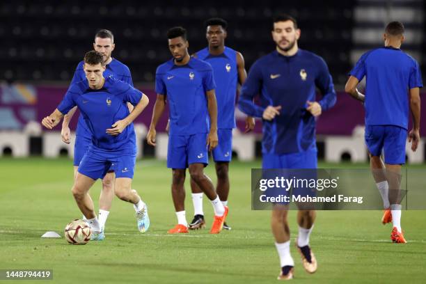 Benjamin Pavard of France trains with teammates during the France Training Session at Al Sadd SC on December 13, 2022 in Doha, Qatar.