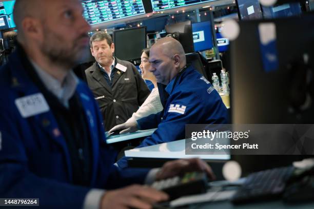 Traders work on the floor of the New York Stock Exchange on December 13, 2022 in New York City. In a sign that the Federal Reserve's rate-raising...