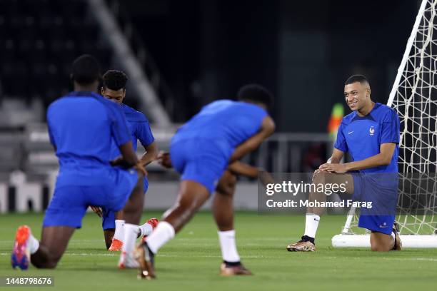 Kylian Mbappe of France reacts during the France Training Session at Al Sadd SC on December 13, 2022 in Doha, Qatar.