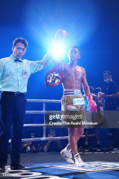 Yoshiki Takei of Japan celebrates his victory over Bruno Tarimo of Australia in their OPBF Super Bantamweight Title Bout at Ariake Arena on December...