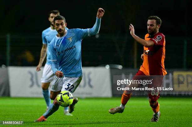 Danilo Cataldi of SS Lazio compete for the ball with Juan Manuel Mata of Galatasary during the friendly match betwen Galatasaray v SS Lazio at the...
