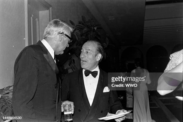Cary Grant and Bruno Pagliai attend a party for the movie "Interval" in Mexico City on the weekend of March 3-4, 1973.