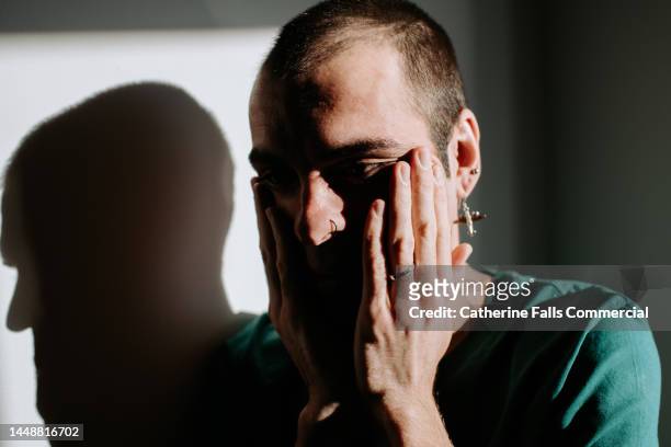 a man in despair - tearing your hair out stock pictures, royalty-free photos & images