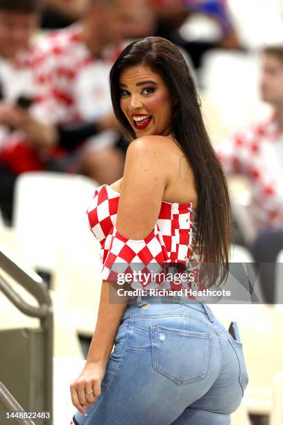 Former Miss Croatia Ivana Knoll poses for a photo in the stands prior to the FIFA World Cup Qatar 2022 semi final match between Argentina and Croatia...