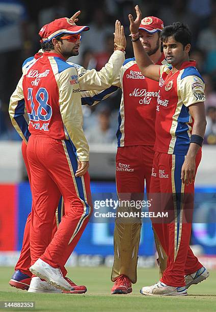 Royal Challengers Bangalore bowler Vinay Kumar celebrates bowling Deccan chargers batsman Akshath Reddy during the IPL Twenty20 cricket match between...