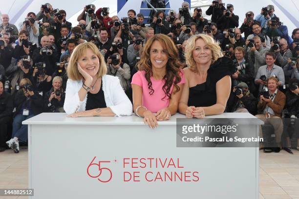 Actresses Susse Wold, Alexandra Rapaport and Anne Louise Hassing pose at the "Jagten" Photocall during the 65th Annual Cannes Film Festival at Palais...